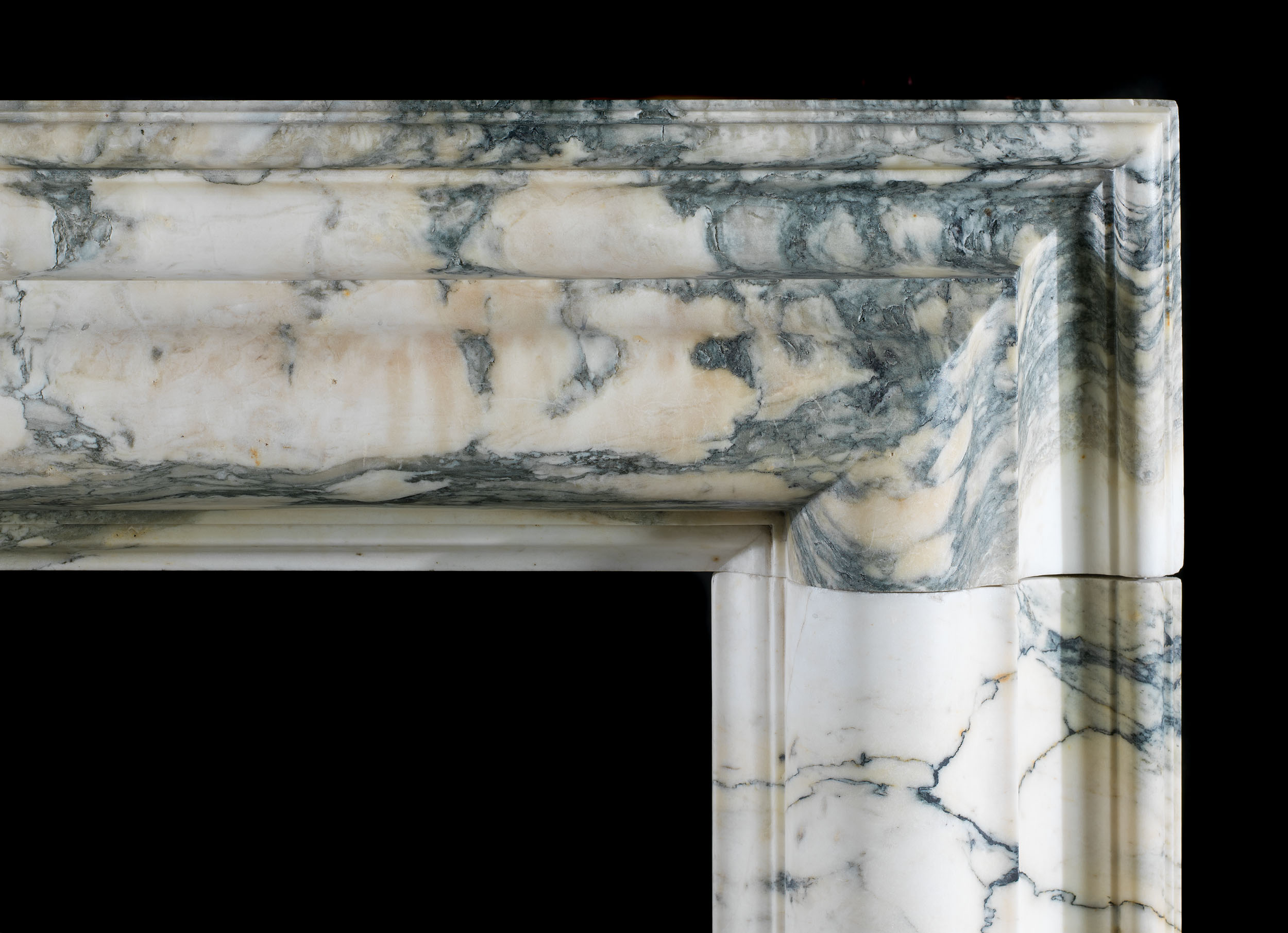 A 20th century Pavonazzo Marble Bolection
