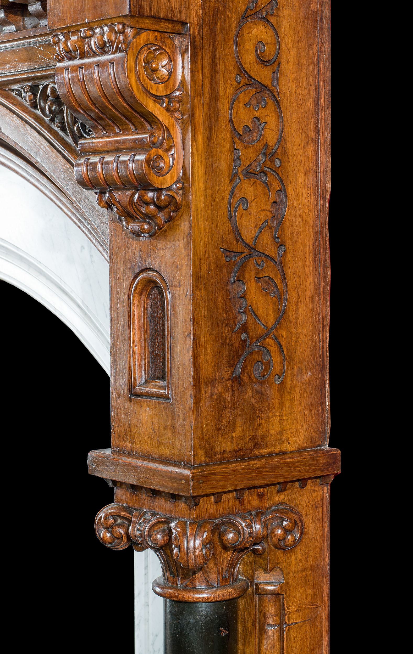 A Tall Gothic Revival Antique Oak Fireplace