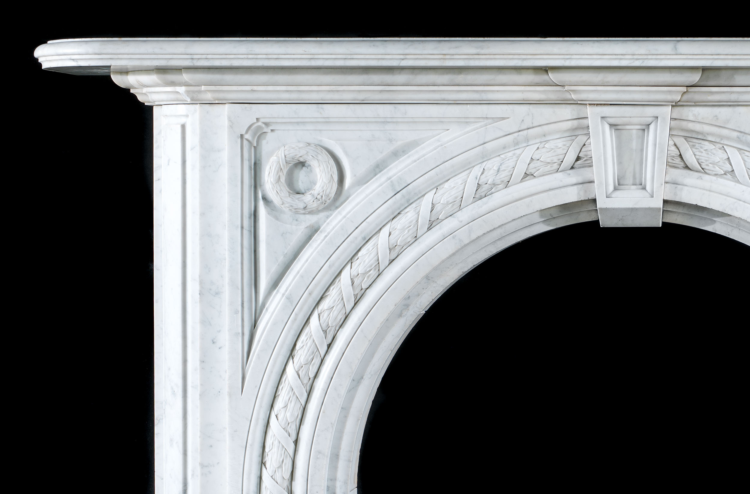 An Arched Carrara Marble Victorian Fireplace
