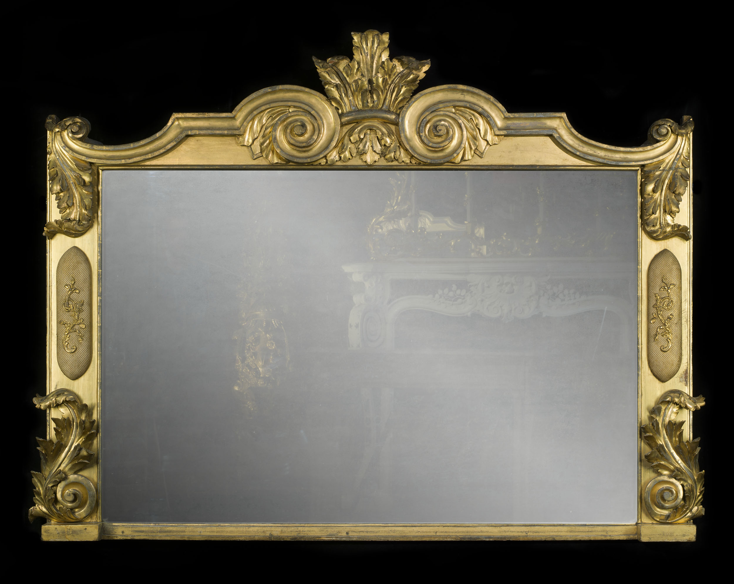 A large giltwood Regency overmantel mirror
