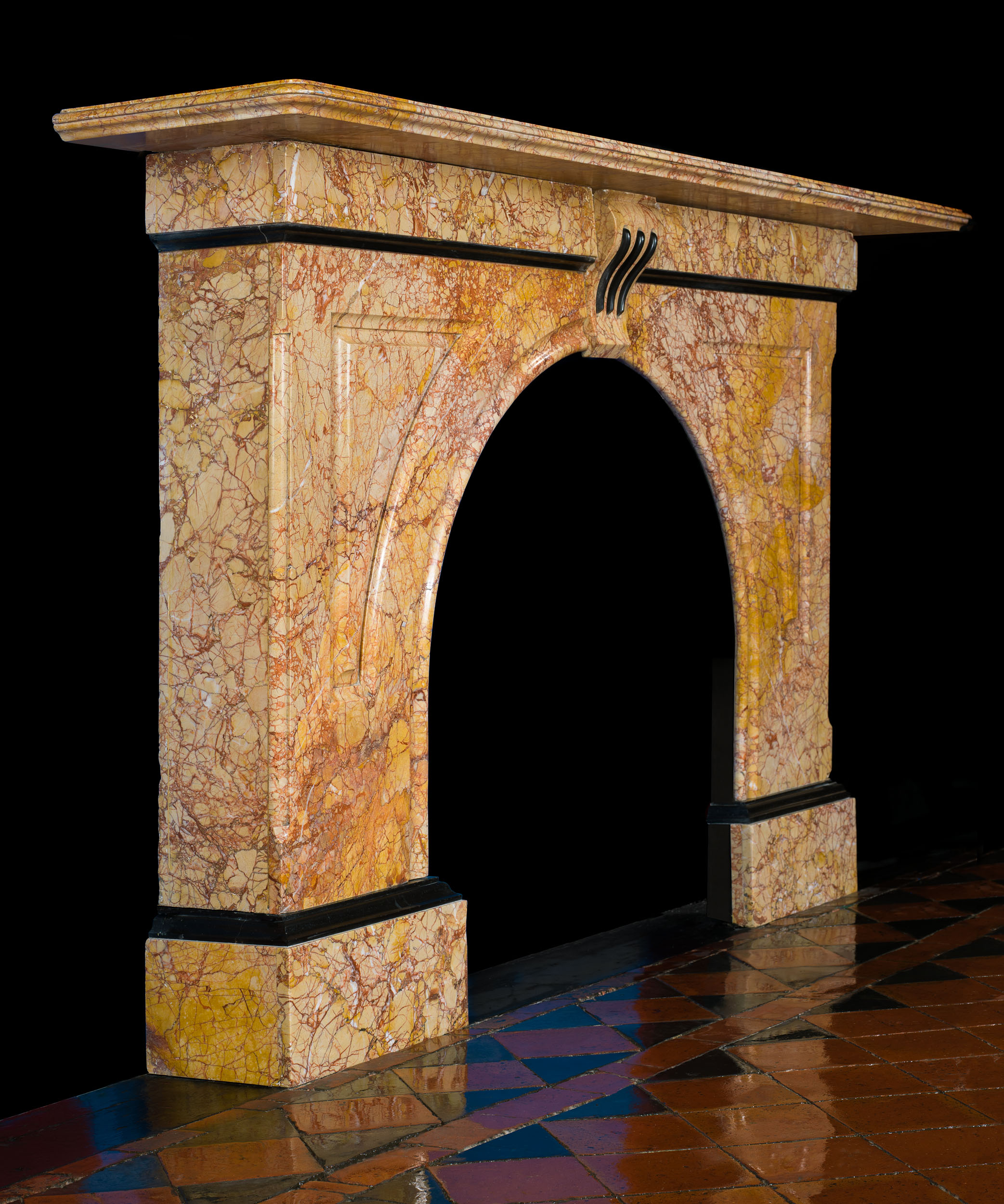 A Rosa Valencia Marble Arched Fireplace 
