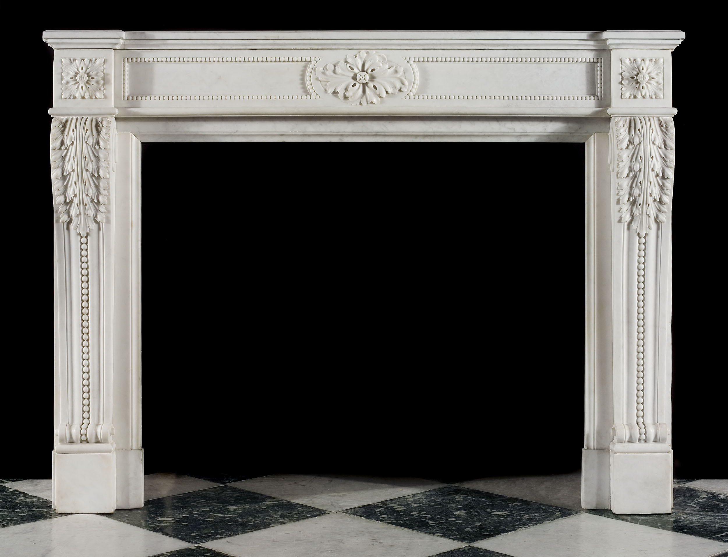 A Louis XVI Statuary Marble Chimneypiece