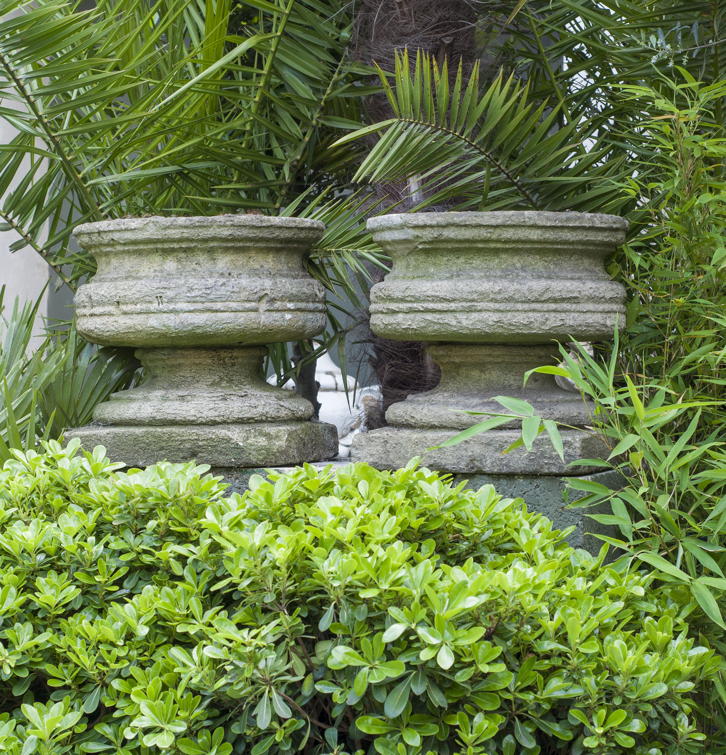 Pair of Neoclassical Style Stone Garden Urns