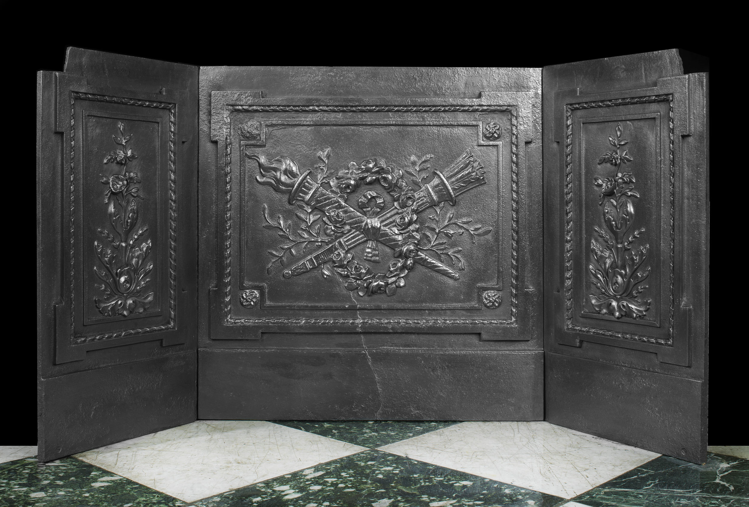A Louis XVI Triple Set of Fireplace Panels