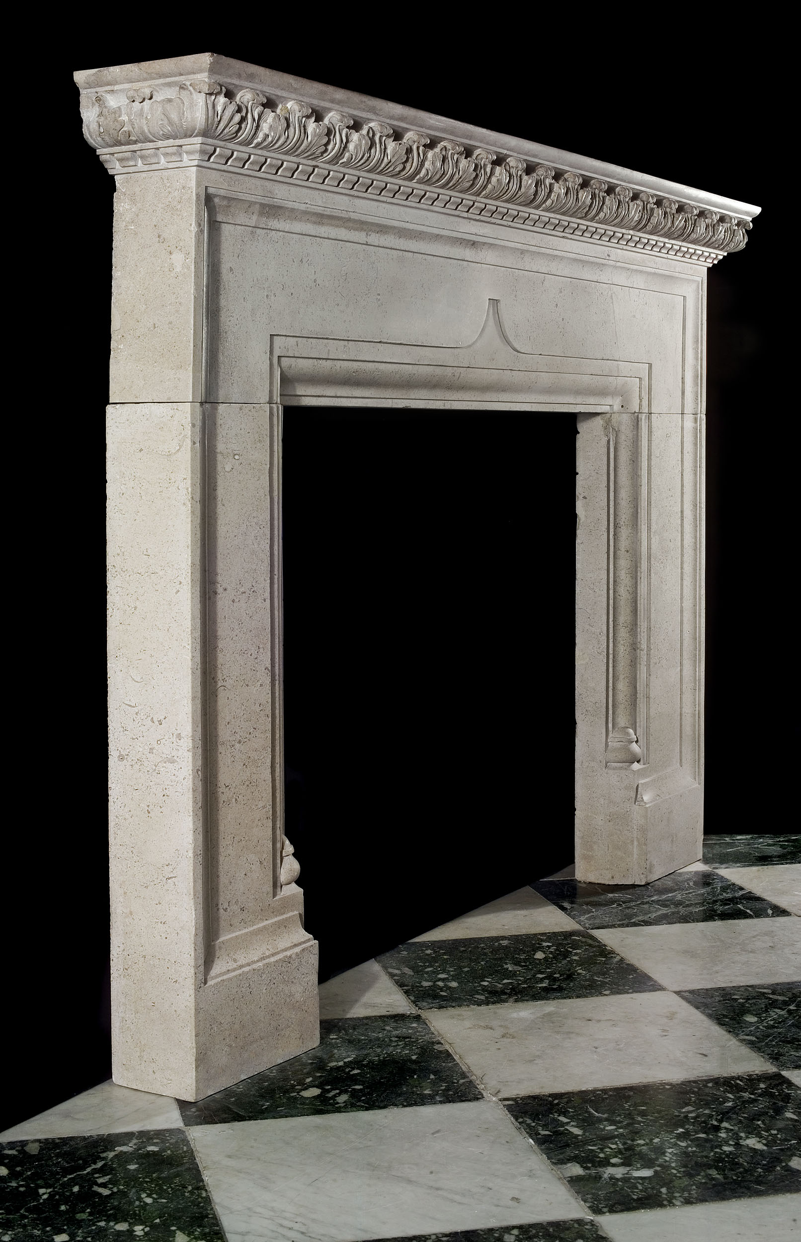 A late 19th century Queen Anne style Baroque stone chimneypiece 
