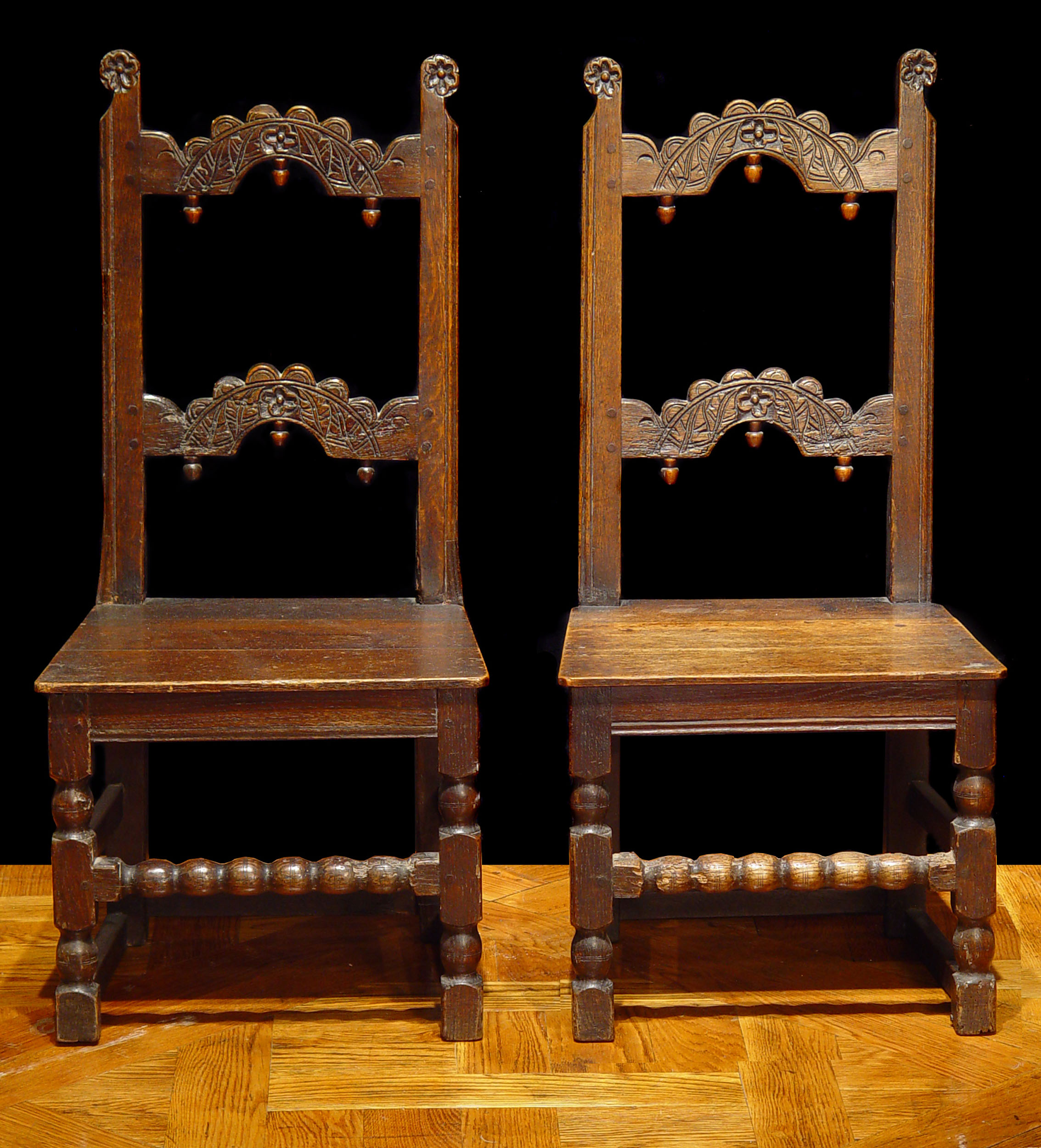 A Rare Pair of 17th Century Oak Hall Chairs