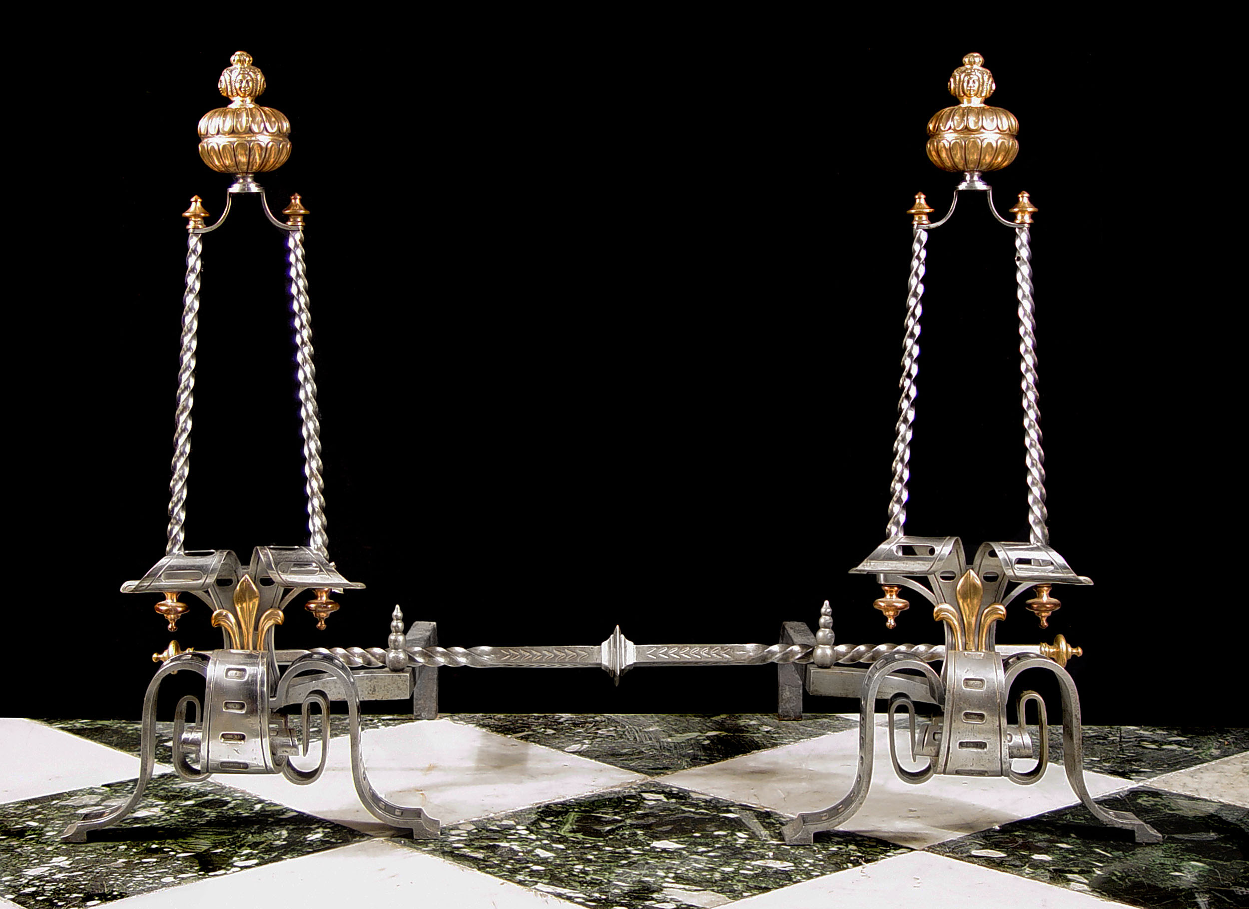 A Pair of Burnished Steel & Bronze Andirons