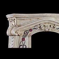 A small Arts & Crafts inlaid marble Fireplace Surround