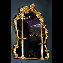  A giltwood and composition English Rococo mirror   