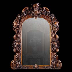  A large Baroque style carved oak antique mirror  