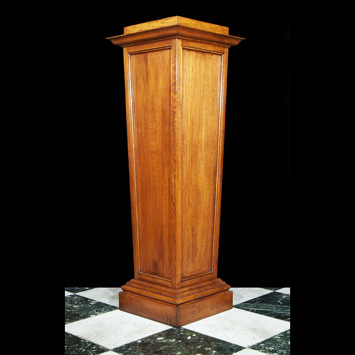 A 20th century Arts & Crafts style oak pedestal 