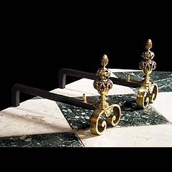 A pair of small Baroque style brass Andirons    