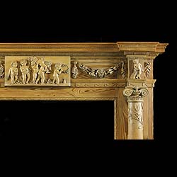 Antique Pine Georgian Chimneypiece with Columned Jambs and Cherubs 
