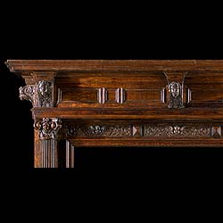 A carved oak Jacobean Revival chimneypiece with 17th Century Elements
