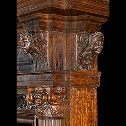 A carved oak Jacobean Revival chimneypiece with 17th Century Elements

