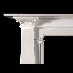 An Egyptian Revival Statuary Marble Fireplace