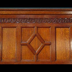 Antique Panelled Oak Arts and Crafts Room with an ornate frieze
