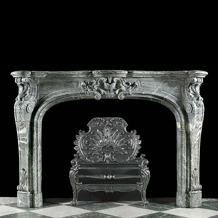 An antique Campana Marble Rococo Fireplace Mantel


