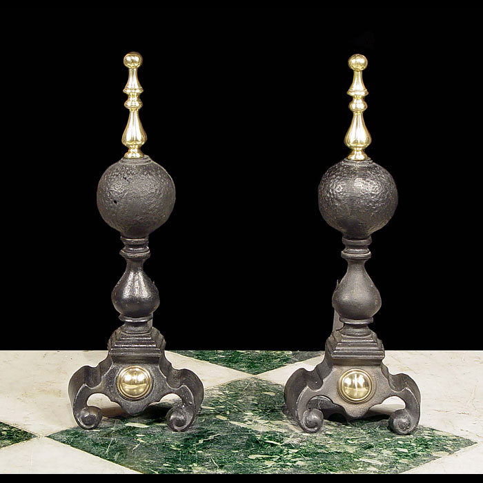 A pair of tall cast iron 20th century Baluster Andirons
