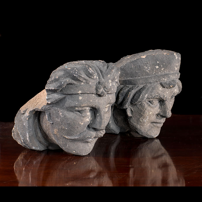 A Tudor style pair of stone figure heads 