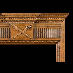 A small carved pine Antique fireplace surround