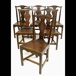 Antique set of Six Chippendale manner Georgian Oak Dining Chairs
 A charming set of period Georgian six Dining Chairs in a Thomas Chippendale style with floral incised design backs. 18th century.
