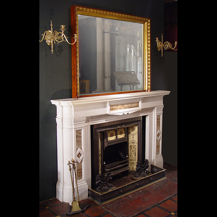 A carved gilded mahogany overmantel mirror
