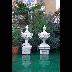 A Pair of White Glazed stoneware Urns