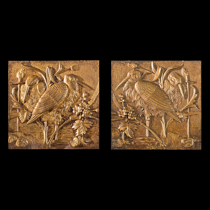A pair of gilt metal Aesthetic tiles