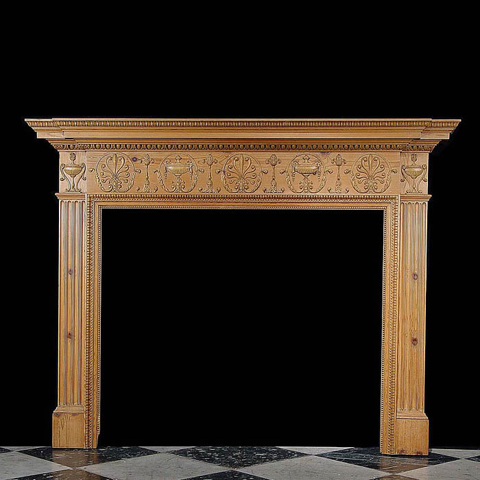 Antique George III style in a Robert Adam manner carved Pine fireplace
