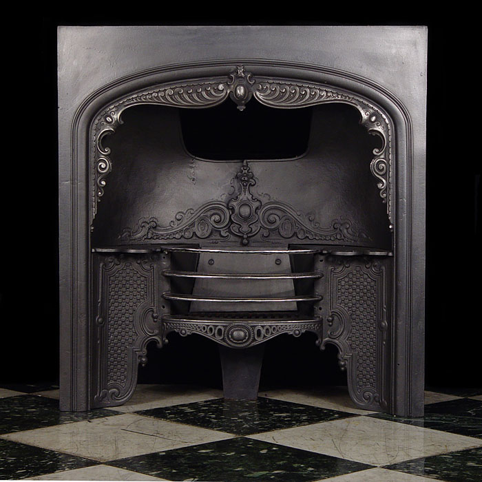 An Antique Cast Iron Fireplace Insert
