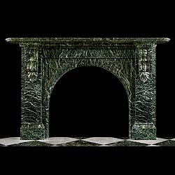 An arched green Verde Antico antique fireplace surround 