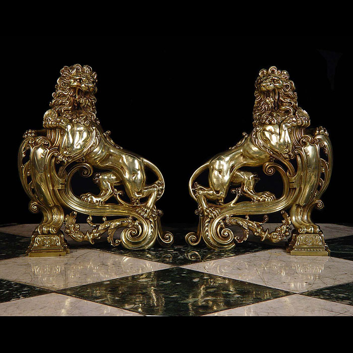  A pair of burnished brass lion antique andirons   