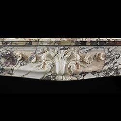 Antique French Rococo Louis XV Fireplace carved in Breche Violette Marble

