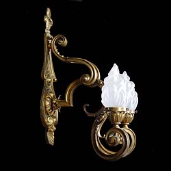 Antique Bronze Wall Sconces with Flambeau Shades
