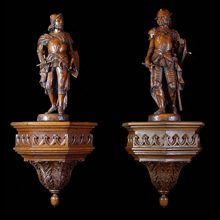 A large pair of carved oak antique warrior kings    