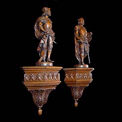 A large pair of carved oak antique warrior kings    