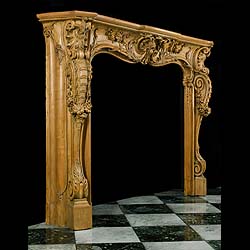 A very rare grand scale 18th century Louis XV style carved Limewood Rococo Chimneypiece


