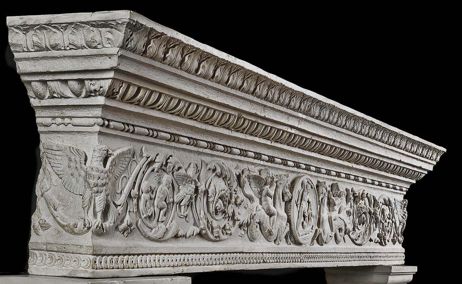 A large 18th century Istrian marble Italian Renaissance fireplace mantel
