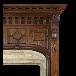 Antique Late 19th century Jacobean Revival fireplace in Oak with large Overmantle
