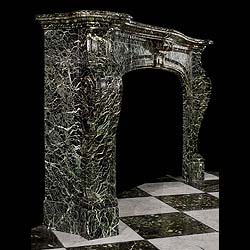 A handsome Verdi Tinos marble antique Chimneypiece 