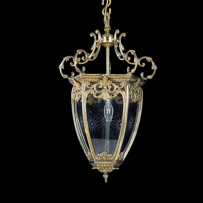 Antique Lantern in Gilt Brass with ornate Windows in Glass
