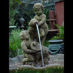 A 20th century composition stone garden fountain 
