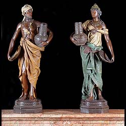 A Pair of Terracotta Nubian Water Carriers
