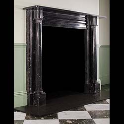 A Kilkenny Black Fossil Marble Fireplace