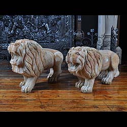 A fine pair of chalcedony lions passant