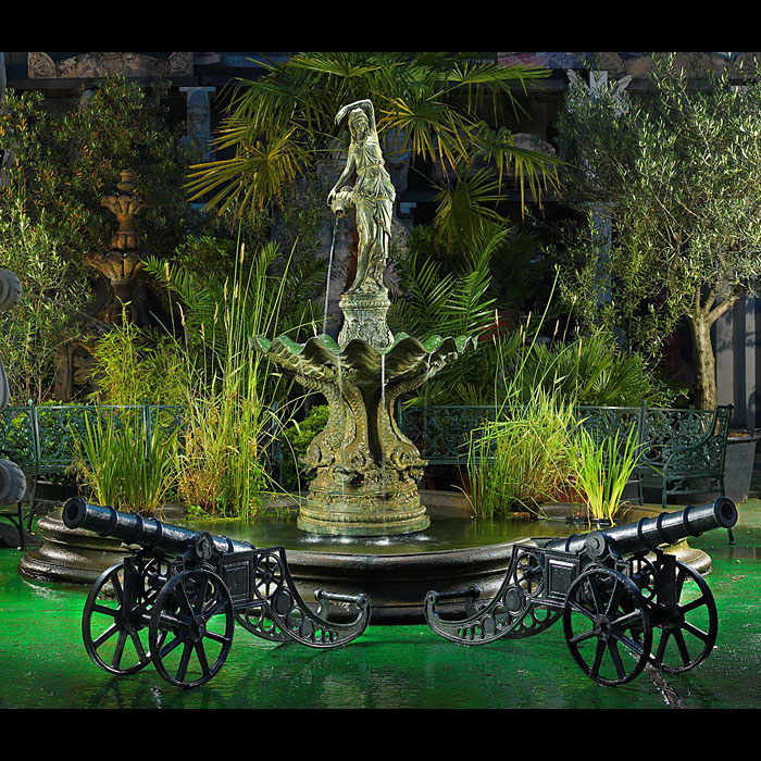 A Baroque style patinated bronze fountain    