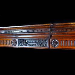 A George III style carved Antique Walnut Chimneypiece Mantel