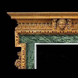 A carved pine Georgian style chimneypiece. Late 19th century
