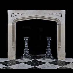 A Jacobean style antique stone fireplace surround    